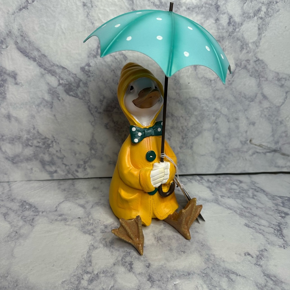 Spring Cotton Tail Lane Duck in Yellow Raincoat under Umbrella